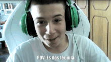 a young man wearing green headphones says " pov es dos tequila "