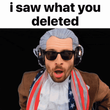 a man wearing a wig and sunglasses says " i saw what you deleted " while wearing headphones