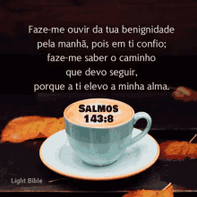 a cup of coffee with a quote from the light bible on it