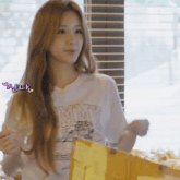 a woman wearing a white tommy hilfiger shirt