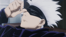 a close up of a person 's face with white hair and a black headband