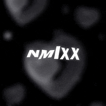 the nmixx logo is on a black background with a broken heart in the foreground .