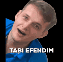 a man in a blue shirt is making a funny face with the words tabi efendim below him