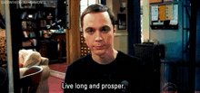 a man says " live long and prosper " in front of a living room