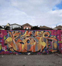 a pink fence with graffiti on it that says nss