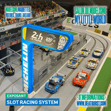 an advertisement for a slot racing system shows a row of cars on a track