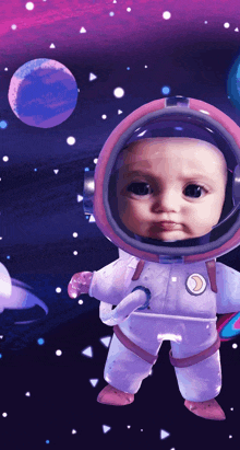 a baby in an astronaut costume with a crescent moon on the chest