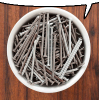 a white bowl filled with nails with a speech bubble above it