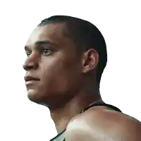 a close up of a man 's face against a white backdrop