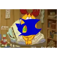 a cartoon character with antlers is sitting on a bed with a blue circle in his mouth .