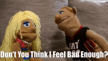 two puppet characters are sitting on a couch and one of them is wearing a fat jersey