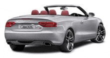 a silver audi a5 convertible with red seats is shown from the back on a white background .