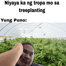 a picture of a man in front of a greenhouse with the caption niyaya ka ng ropa mo sa treeplanting yung puno