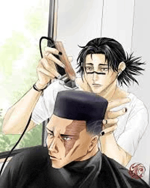 a man is getting his hair cut by a barber at a barber shop .
