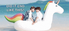 two men are sitting on an inflatable unicorn on the beach with the words did it end like this behind them