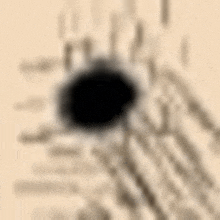 a close up of a cat 's eye with a black spot in the middle .