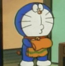 a cartoon character named doraemon is standing in a room with his arms crossed