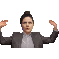 a woman in a suit is making a funny face with her arms outstretched