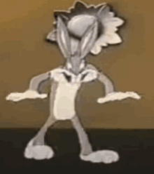 a cartoon rabbit is standing on a table with his arms outstretched and a ball on his head .