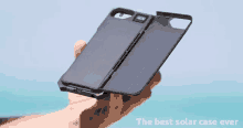 a person is holding a phone case that says the best solar case ever on the bottom