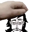 a close up of a person 's face with a hand on top of it .