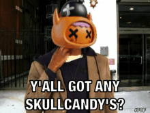 a man wearing a skull candy mask says y all got any skullcandy 's