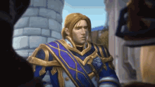 a man in a blue and gold armor is standing in front of a castle