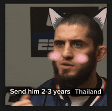 a man with cat ears and the words send him 2-3 years thailand on the bottom