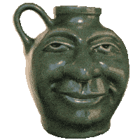 a green pitcher with a face on it is smiling