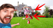 a man is pointing at a cartoon character named amy rose