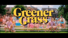 a movie poster for greener grass shows a group of people sitting on the bleachers