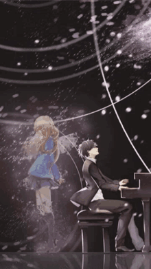 a man playing a piano with a girl behind him