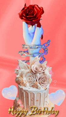 a birthday cake with a hand holding a rose and the words happy birthday below it