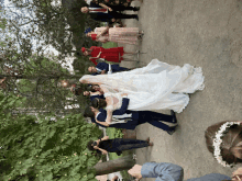 a bride and groom are dancing with their wedding guests