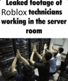 a group of men are working in a server room