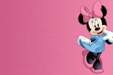 minnie mouse is wearing a blue dress and a pink bow and is standing on a pink background .