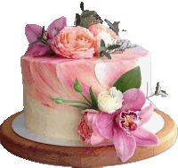 a pink and white cake with flowers on it