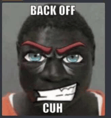 a picture of a man with a cartoon face painted on his face and the words `` back off cuh '' written on it .