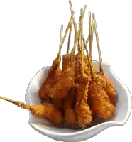 a white bowl filled with fried chicken sticks