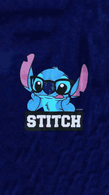 a picture of stitch wearing glasses on a blue shirt