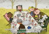 a group of peanuts characters are sitting around a table with food