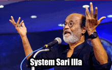 a man speaking into a microphone with the words system sari illa written below him