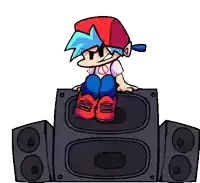 a cartoon character sitting on top of a speaker .