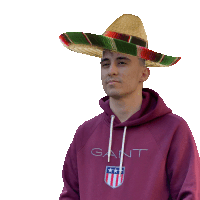 a man wearing a sombrero is wearing a gant sweatshirt