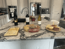 a bottle of le chateau sits on a counter