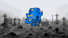 a blue monster is standing in a cemetery with crosses