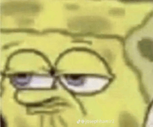 a close up of a cartoon character 's face with a spongebob squarepants face .