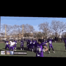 a group of football players are standing on a field and one of them has the number 12 on his jersey