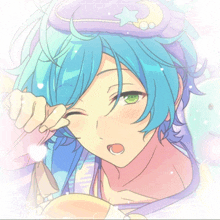 a boy with blue hair and green eyes is wearing a sleep mask with a star on it