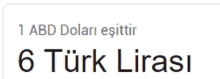 a white sign that says 1 abd dolari eşittir 6 turk lirasi